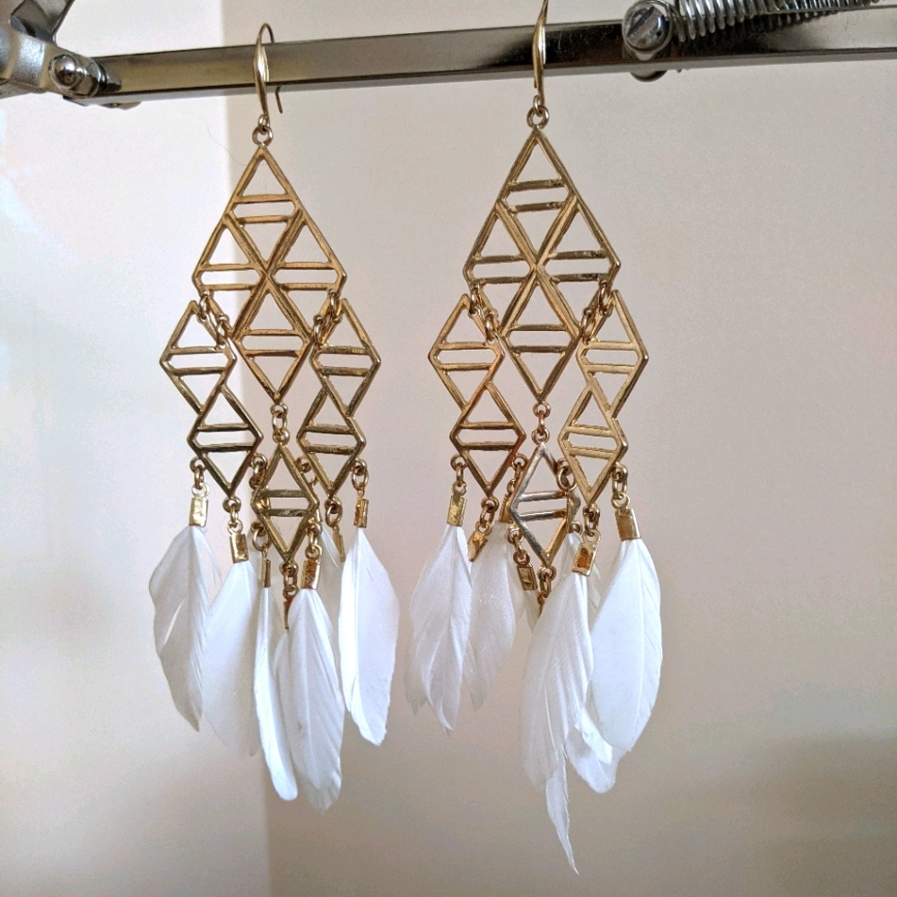 Gold and white feather earrings